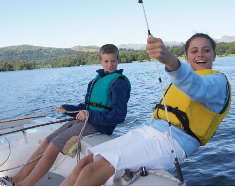 Two people in a boat on the water